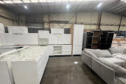 White satin Hampton L-shape handleless kitchen (pick up only).