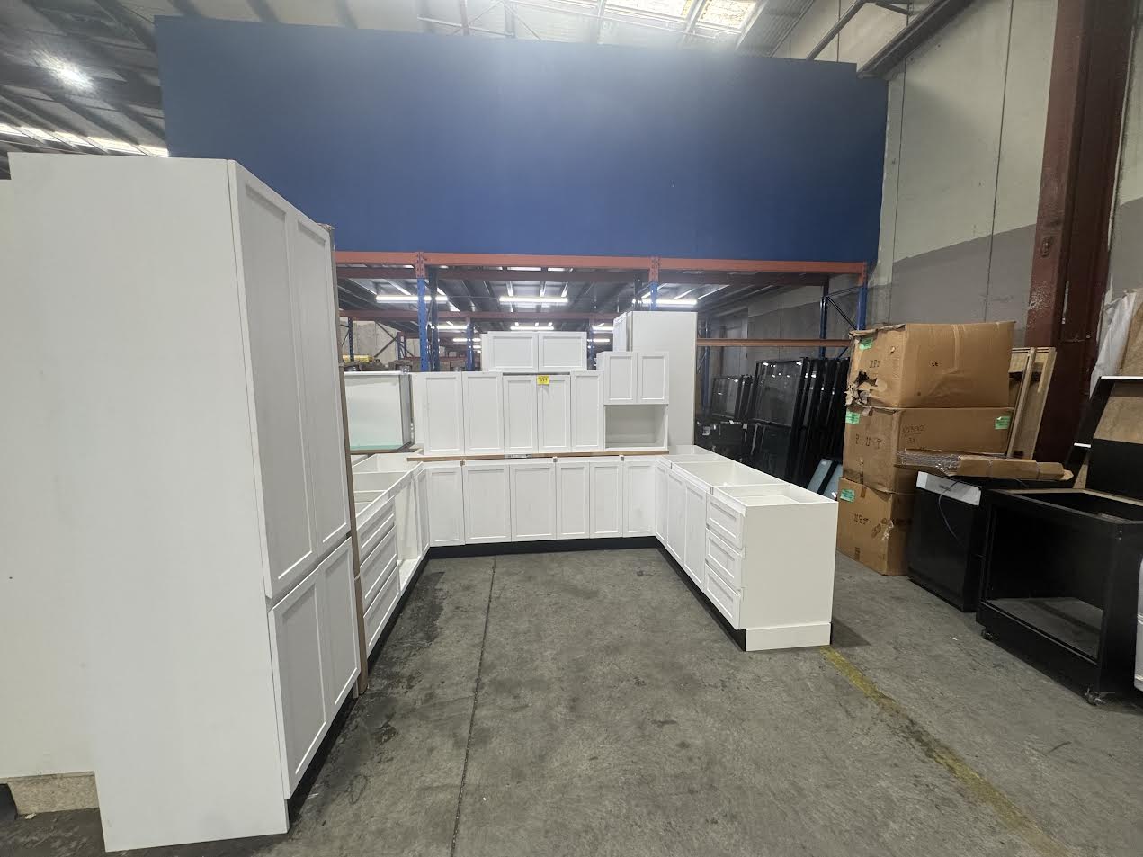White satin Hampton handleless U-shape kitchen (pick up only).