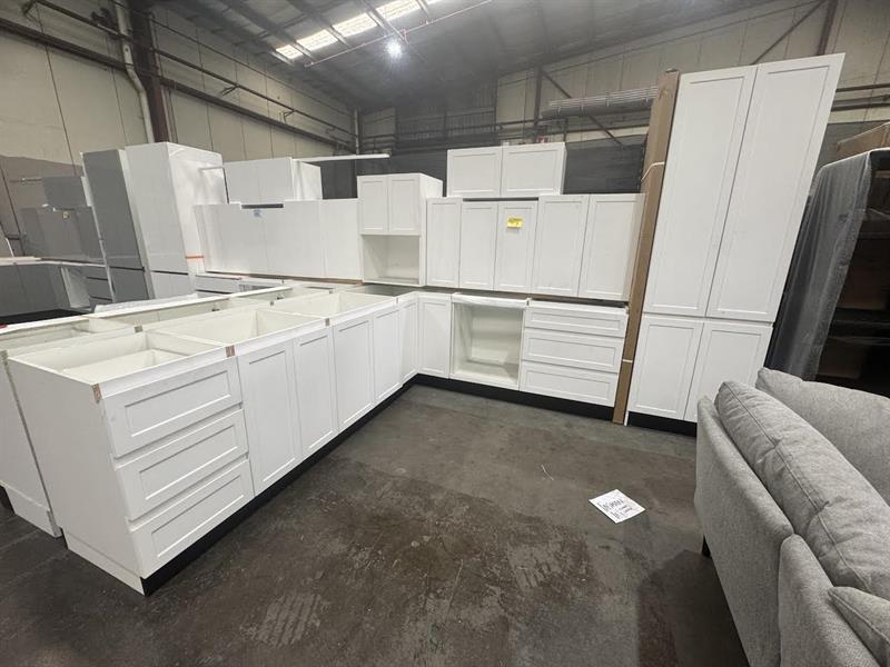 White satin Hampton L-shape handleless kitchen (pick up only).